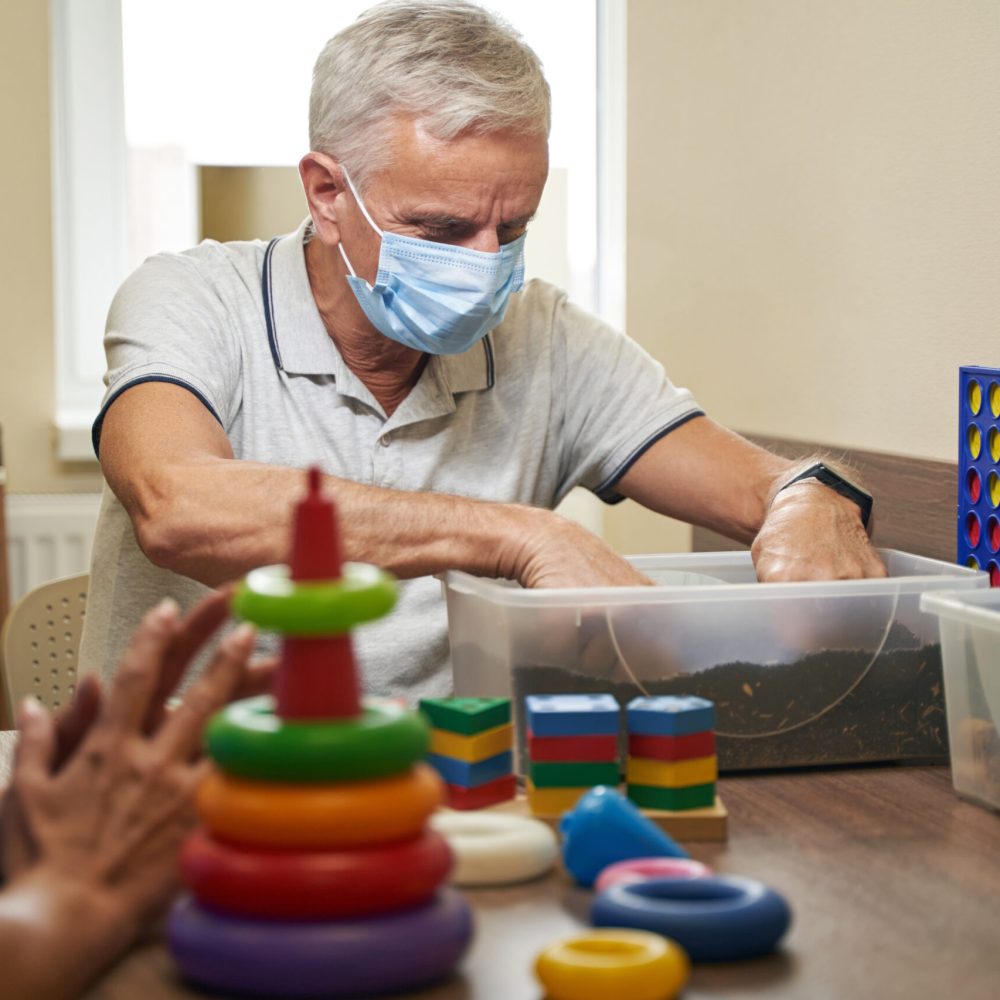 Stroke patient doing occupational therapy at home.